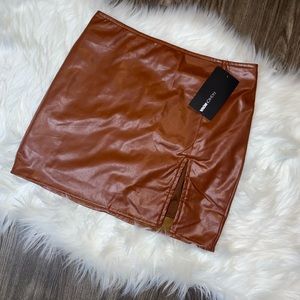 Leather Mini skirt w/slit from Fashion Nova. NWT